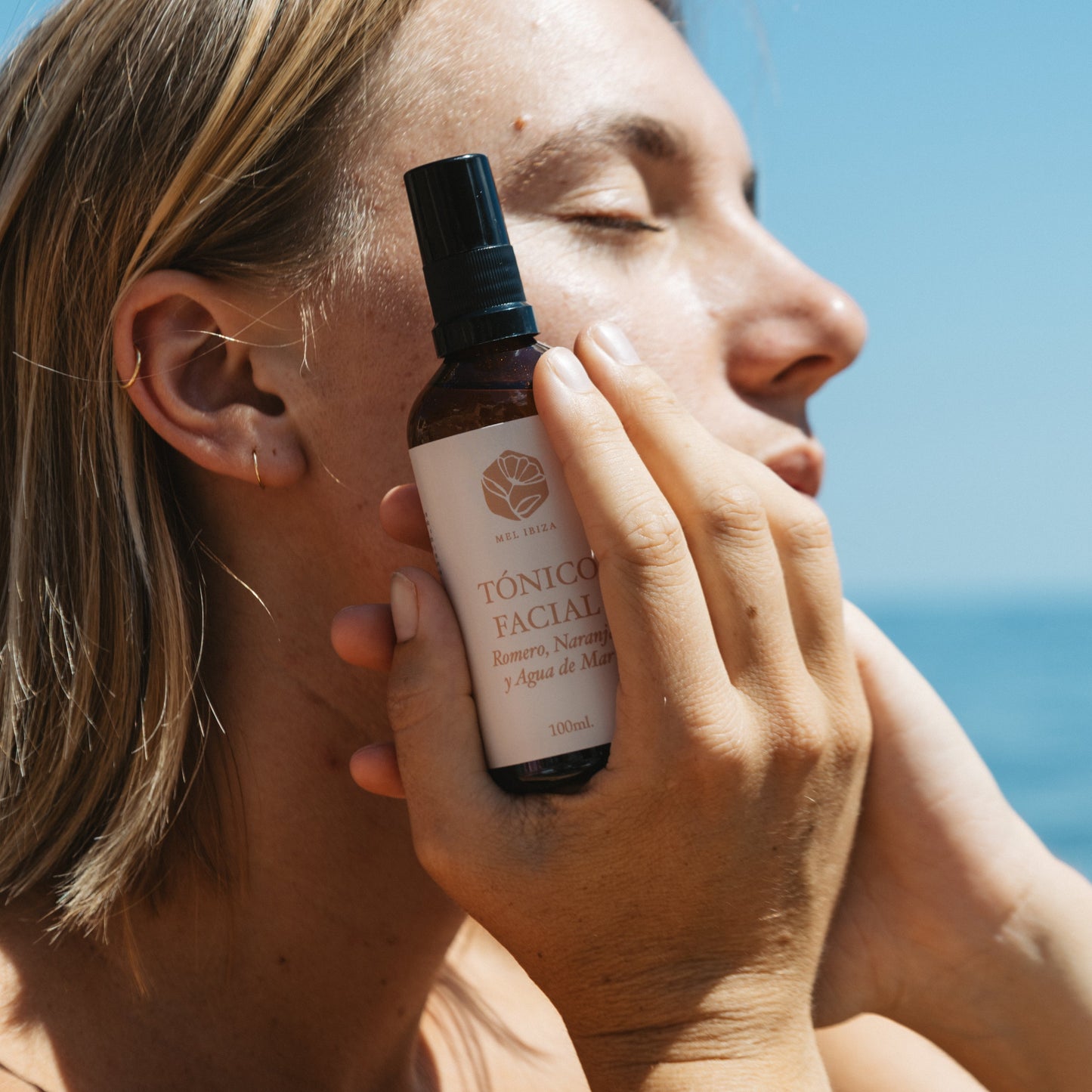 Tónico facial natural con agua de mar, romero y naranja
